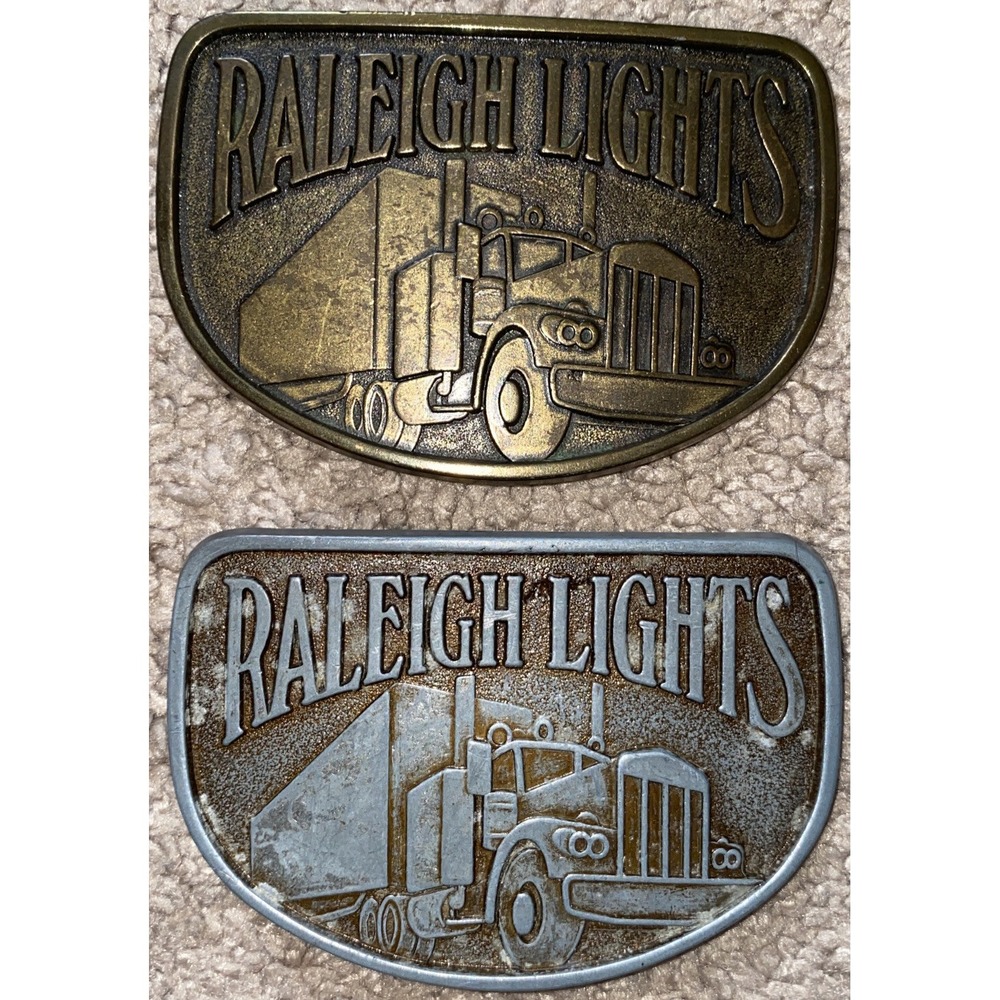 Lot of 2 Raleigh Lights Metal Belt Buckle Cigarette/Trucker 1 Brass 1 Silver